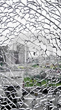 broken window glass closeup. view from broken window. shattered window glass. Cracked window glass