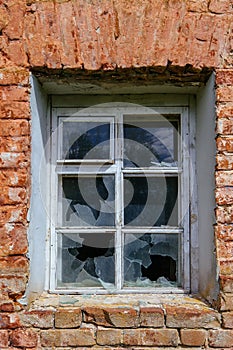 Broken window of old house