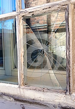 Broken window in an old house