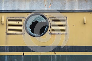Broken window of old train