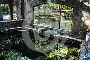 Broken Windowpanes of an Old Springhouse at Paradise Springs