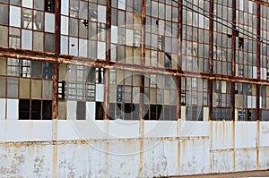 Broken windows on an abandoned factory