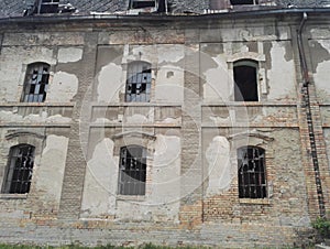 Broken windows on abandoned industrial buildings