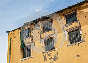 Broken windows of an old brewery building. The old building of the brewery in the city of Nitra, Slovakia