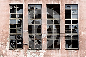 Broken windows on old warehouse