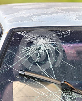 Broken windshield on a car.