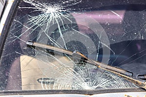 Broken windshield on a car.