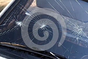 Broken windshield on car