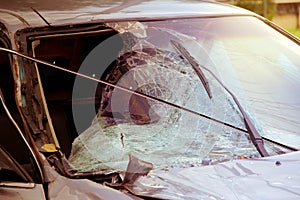 The broken windshield in car accident