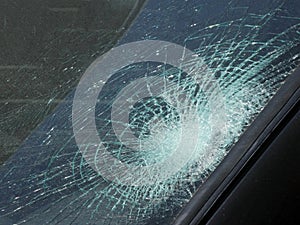 Broken windshield of a car in an accident