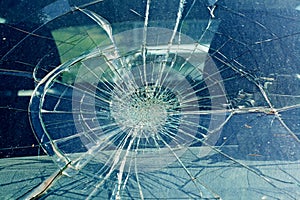 The broken windshield in the car accident