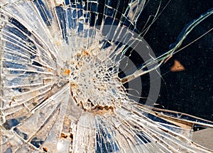 The broken windshield in the car accident