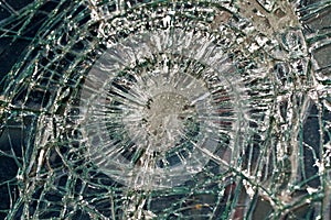 The broken windshield in the car accident