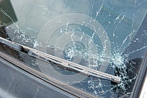 The broken windshield in car accident