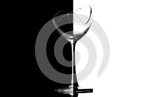 Broken wineglass on a black and white background