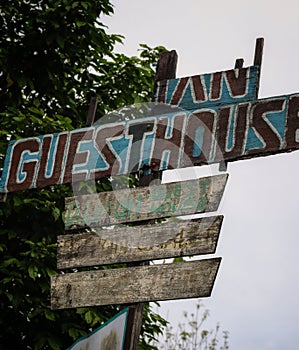 Broken wooden advertisement board