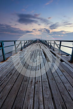 Broken wooden jetty at sunrise in Sabah, East Malaysia