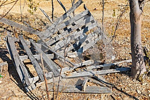 A broken wooden pallet along a desert highway in Baja
