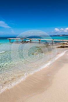 Broken wooden pier Illetes beach Formentera island