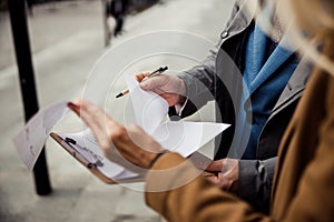 Broker showing a contract to his client