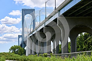 The Bronxâ€“Whitestone Bridge. a suspension bridge, carries traffic over the East River from Bronx to Queens, NYC