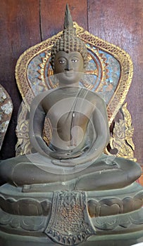 Bronz Buddha image and wheel of Dhama
