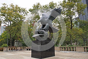 Bronze American Eagle, centerpiece of the WWII Memorial in the Battery Park in Lower Manhattan, New York, NY