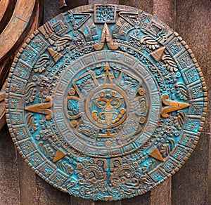 Bronze ancient antique classical Aztec calendar round ornament pattern decoration design background. Aztec abstract texture fracta photo