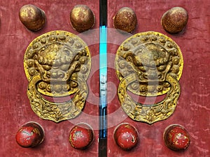 The bronze bolt on the ancient gate of the temple of heaven