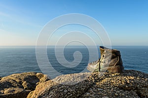 The bronze boot at the end of the world photo