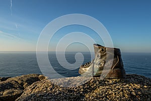 The bronze boot at the end of the world photo