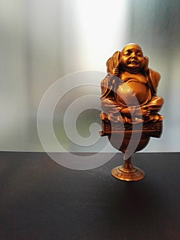 Bronze Buddha figurine. Meditation and tranquility. Buddhism. Feng shui.