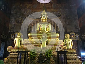 Bronze Buddha Statue in Temple of Bells, Thailand photo