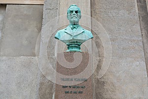 Bronze bust of Vilhelm Thomsen in front of main building of Copenhagen University