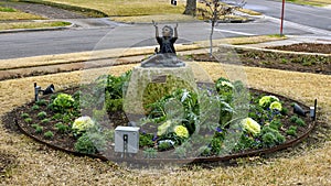 Bronze of Child with Butterflies in Elena`s Childrens Park at Christmas in University Park, Texas