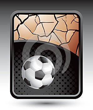 Bronze cracked background with soccer ball