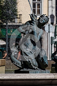 Bronze divinity statues in the fountain