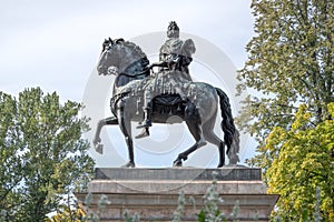 A bronze equestrian monument of Peter The Great in front of the St. Michael\'s Castle in Saint Petersburg, Russia