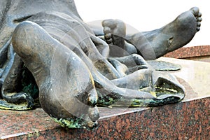 Bronze feet of a statue
