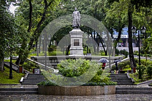 The bronze figure of Lazo, made to his full height, is set on a granite pedestal. The commander`s right hand is clenched into a fi photo