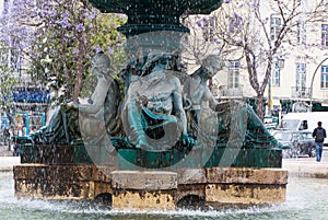 Bronze fountain at Rossio square in Lisbon