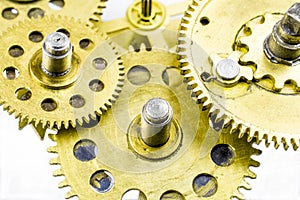 Bronze gears from the old clock isolated on white background