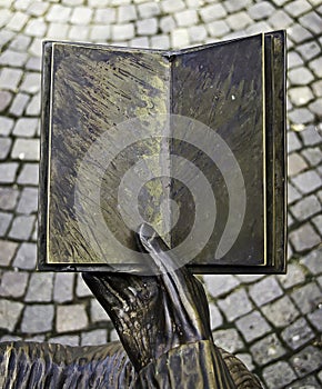 Bronze Hand With Book