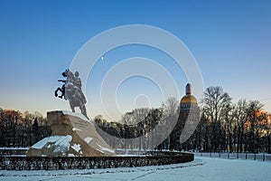 Bronze horseman and Isaac cathedral in evening