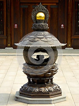 A bronze incense burner