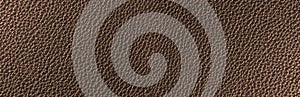 Bronze leather texture. Copper colored web banner. Leather texture shot very close up. Background suitable for any graphic design photo