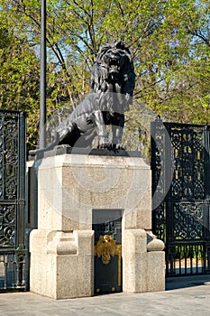 Bronze lion at the gates of Chapultepec Park in Mexico City photo