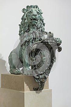 Bronze lion with shield
