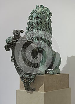 Bronze lion with shield