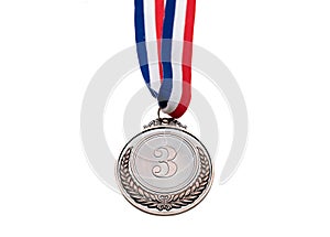 Bronze medal. Champion trophy award and ribbon. Prize in sport for third place isolated on white